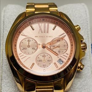 Women’s Rose Gold metal watch.